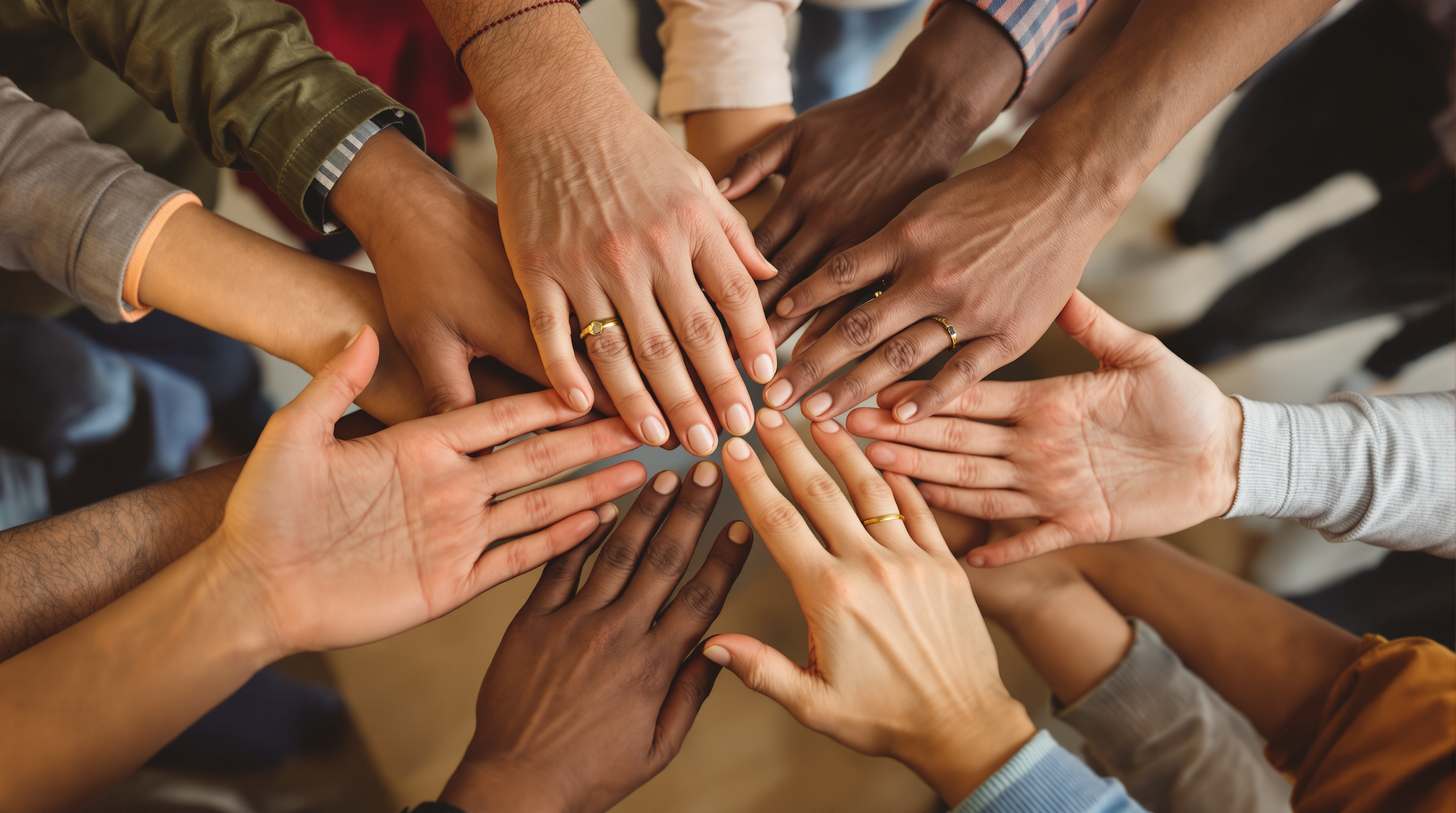 Community members joining hands in unity